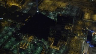 DCA03_073 - 4K aerial stock footage of flying by Luxor Hotel and Casino, Las Vegas, Nevada Night