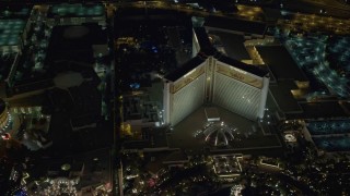 DCA03_078 - 4K aerial stock footage of flying by Mirage Hotel and Casino, Las Vegas, Nevada Night