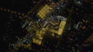 DCA03_086 - 4K aerial stock footage of bird's eye view of Las Vegas Boulevard, top of Stratosphere, Las Vegas, Nevada Night