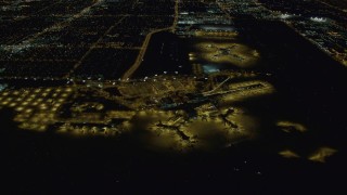 DCA03_103 - 4K aerial stock footage of McCarran International Airport, Las Vegas, Nevada Night