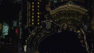 DCA03_118 - 4K aerial stock footage of bird's eye view of The Bellagio, The Bellagio Fountain, Caesar's Palace, Las Vegas, Nevada Night