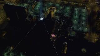 DCA03_141 - 4K aerial stock footage of orbiting Luxor Hotel and Casino, Las Vegas, Nevada Night