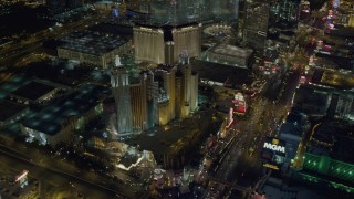 DCA03_143 - 4K aerial stock footage of approaching New York New York Hotel and Casino, Las Vegas, Nevada Night