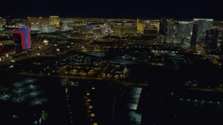 DCA03_156 - 4K aerial stock footage of panning across the Las Vegas Strip revealing hotels, Nevada Night