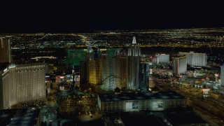 DCA03_159 - 4K aerial stock footage of approaching New York New York Hotel and Casino, Las Vegas, Nevada Night