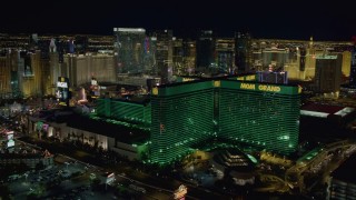 DCA03_165 - 4K stock footage aerial video of flying by MGM Grand, Las Vegas, Nevada Night