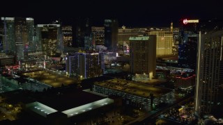 DCA03_166 - 4K aerial stock footage of flying near hotels on Las Vegas Strip, Nevada Night