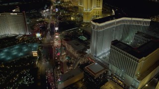 DCA03_177 - 4K aerial stock footage of flying over hotels and Las Vegas Boulevard, Nevada Night