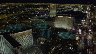 DCA03_181 - 4K aerial stock footage of hotels on Las Vegas Boulevard, Mirage Hotel and Casino, Nevada Night