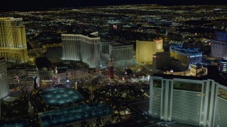 DCA03_183 - 4K aerial stock footage of approaching The Venetian Resort and Casino, Las Vegas, Nevada Night