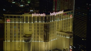 DCA03_198 - 4K aerial stock footage of zooming closer to Planet Hollywood Resort and Casino, Las Vegas, Nevada Night