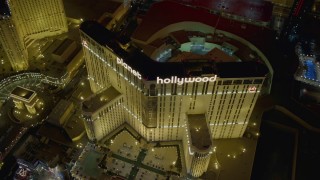 DCA03_202 - 4K aerial stock footage of orbiting front of Planet Hollywood Resort and Casino, Las Vegas, Nevada Night
