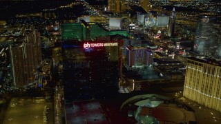 DCA03_203 - 4K aerial stock footage of Planet Hollywood Towers Westgate, Las Vegas, Nevada Night