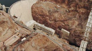 DCA04_008 - 4K aerial stock footage of panning across Colorado River, revealing Hoover Dam, Boulder City, Nevada