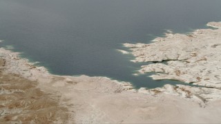 DCA04_013 - 4K aerial stock footage of flying by Gypsum Bay on Lake Mead, Las Vegas, Nevada