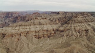 DCA04_021 - 4K aerial stock footage of tilt up revealing Grand Canyon, Arizona