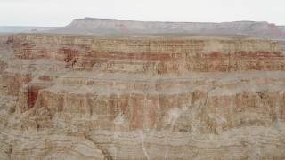 DCA04_027 - 4K aerial stock footage of flying by a rock wall in Grand Canyon, Arizona