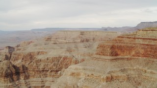 DCA04_050 - 4K aerial stock footage of flying by cliffs and rock formations in Grand Canyon, Arizona