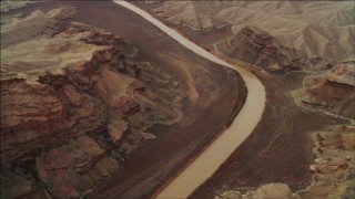 DCA04_051 - 4K aerial stock footage of panning across the Colorado River to rock formations in Grand Canyon; Arizona