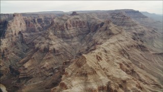 DCA04_054 - 4K aerial stock footage of flying by rock formations in Grand Canyon, Arizona