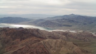 DCA04_060 - 4K aerial stock footage of South Cove seen from foothills, Lake Mead, Nevada