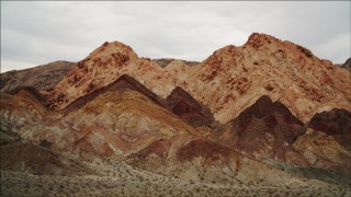 DCA04_077 - 4K aerial stock footage of flying toward a peak in Hiller Mountains, Nevada