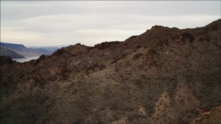 DCA04_080 - 4K aerial stock footage of flying over rocky ridges in Hiller Mountains, Nevada
