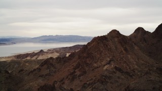 DCA04_083 - 4K aerial stock footage of panning from Lake Mead to the Hiller Mountains, Nevada
