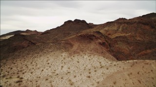 DCA04_087 - 4K aerial stock footage of flying toward mountains near Lake Mead, Nevada