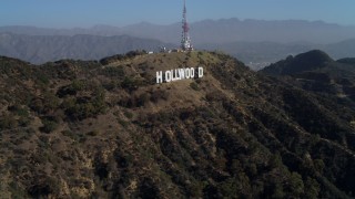 DCA05_006 - 4K aerial stock footage of approaching the Hollywood Sign, Los Angeles, California