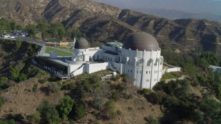 DCA05_013 - 4K aerial stock footage of orbiting the Griffith Observatory, south side, Los Angeles, California