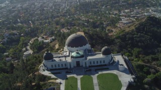 DCA05_014 - 4K aerial stock footage of orbiting the Griffith Observatory, north side, Los Angeles, California