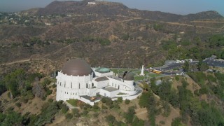 DCA05_017 - 4K aerial stock footage of orbiting the Griffith Observatory, south side, Los Angeles, California