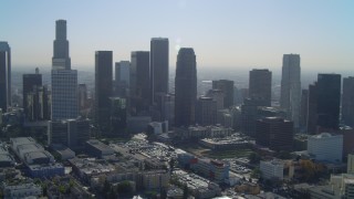 DCA05_026 - 4K aerial stock footage of approaching Aon Center, Figueroa at Wilshire, Downtown, Los Angeles, California