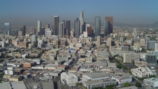 DCA05_030 - 4K aerial stock footage of Downtown Los Angeles, East 4th Street and skyscrapers, California