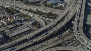 DCA05_050 - 4K aerial stock footage of Interstate 110 and 10 interchange, Downtown Los Angeles, California