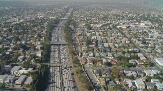 DCA05_056 - 4K aerial stock footage of following Interstate 10 through Pico-Union, Los Angeles, California