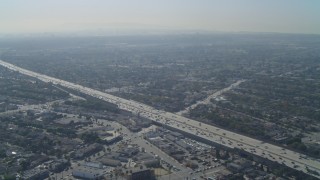 DCA05_061 - 4K stock footage aerial video of tilting from Washington Boulevard, reveal Interstate 405, Culver City, California