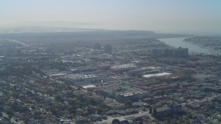 DCA05_062 - 4K aerial stock footage of flying by residential neighborhoods in Marina Del Rey, California