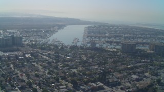 DCA05_063 - 4K aerial stock footage video of residential neighborhoods next to marina, Marina Del Rey, California