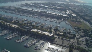 DCA05_065 - 4K aerial stock footage of flying by boats in the marina, Marina Del Rey, California