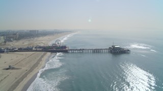 DCA05_087 - 4K aerial stock footage of approach Santa Monica Pier, bird's eye view, end of pier, Santa Monica, California