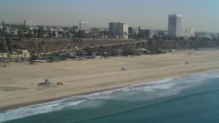 DCA05_094 - 4K aerial stock footage video of flying by Santa Monica State Beach. Santa Monica, California