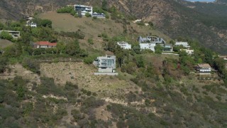 DCA05_113 - 4K aerial stock footage of approaching a home in the Malibu hills, Malibu, California 