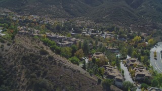 DCA05_145 - 4K aerial stock footage of flying by homes on a hill, Westlake Village, California