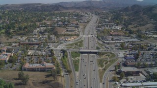 DCA05_150 - 4K aerial stock footage of following Highway 101, Agoura Hills, California
