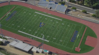 DCA05_151 - 4K aerial stock footage of orbiting a soccer practice, Agoura High School, Agoura Hills, California