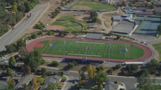 DCA05_152 - 4K stock footage aerial video of flying by soccer practice, Agoura High school field, Agoura Hills, California