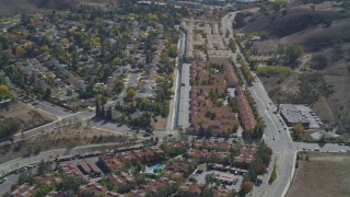 DCA05_154 - 4K aerial stock footage pan across neighborhoods, reveal apartment buildings, Calabasas, California