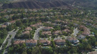 DCA05_155 - 4K stock footage aerial video of flying over residential neighborhoods, Calabasas, California
